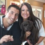 chocolate puppy with his new owners- Endless Mt. Labradors