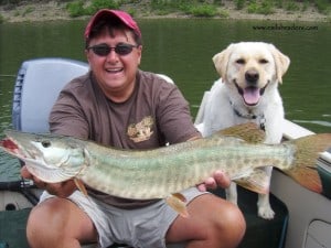 Dog with fish- Endless Mt. Labradors